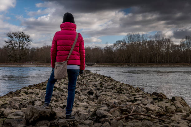 istock woman looking to Rhine River 1369801088