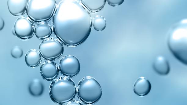 istock Transparent Cosmetic Gas Bubbles Under Water in Full Frame Macro Close Up 1369802155