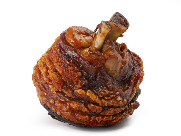 grilled crusty pork knuckle isolated on white background.