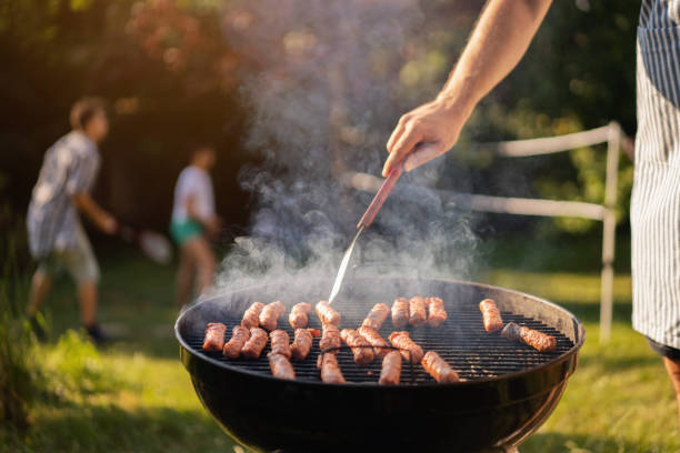istock During BBQ party, unrecognizable man grilling the beef meat on the BBQ grill 1369805062