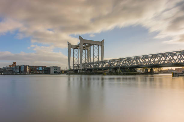 istock Big railway bridge over river Oude Maas in Dordrecht 1369806400