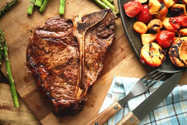 Photo of Grilled T-Bone Steak with Asparagus, Tomatoes and Mushrooms