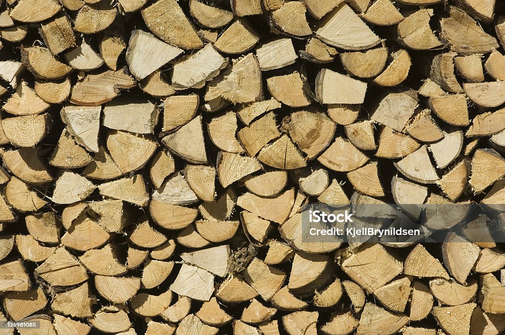 Stack of firewood A stack of pine firewood Abstract Stock Photo