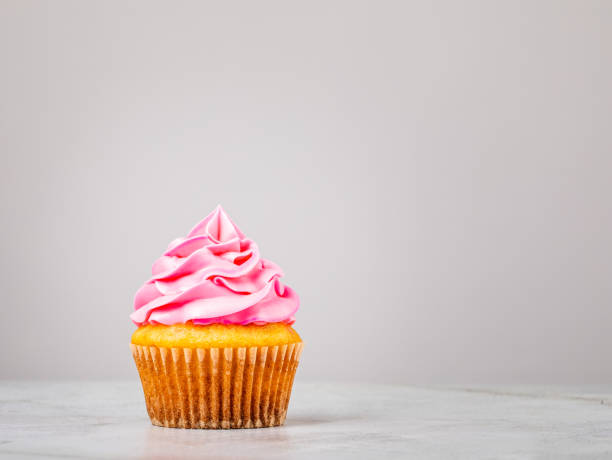 istock Vanilla Cupcake with pink Buttercream Icing. 1369812795