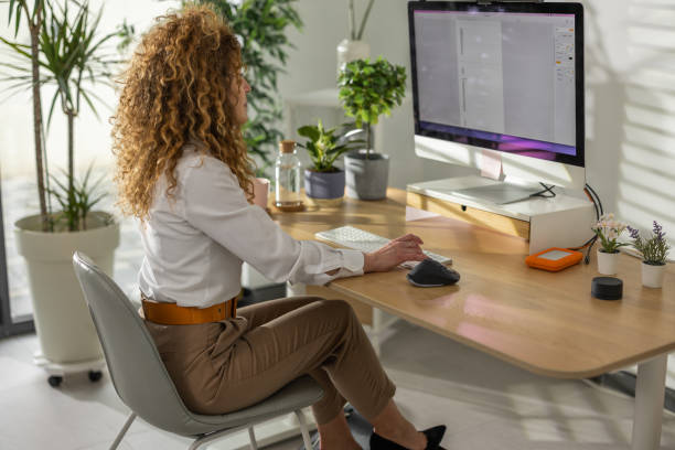 istock Businesswoman in office 1369815563