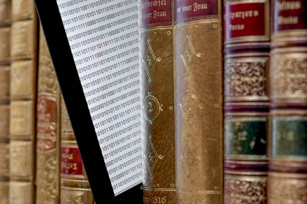 istock old books on the shelf with a tablet in between 1369815864