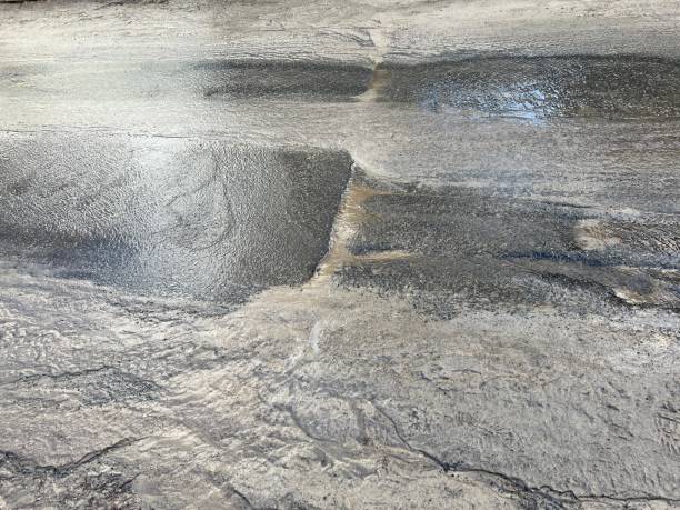 gray mud background. spring mud and puddles on the road, natural pattern. - dirt road textured dirt mud imagens e fotografias de stock