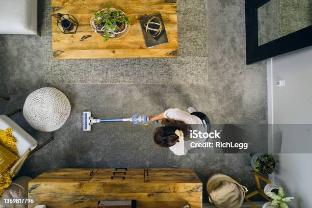 Professional Housecleaner At Work Stock Photo - Download Image Now - Housework, Housekeeping Staff, Vacuum Cleaner