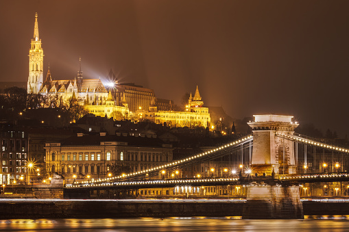 Budapest, Hungary night view of Chain Bridge Szechenyi Lanchid on Danube river.