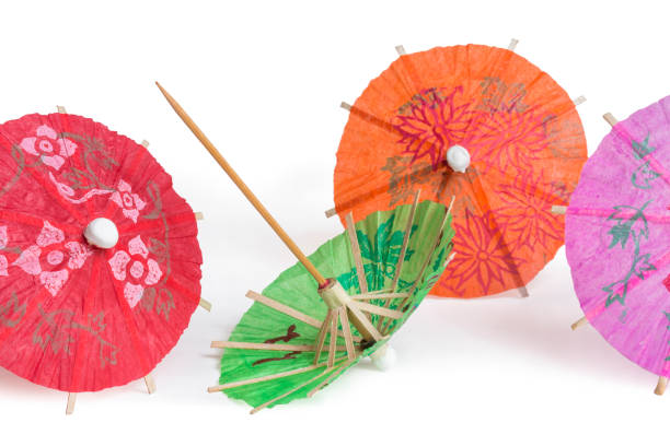 istock Cocktail drink umbrellas, paper parasols 1369821248