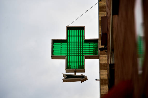 istock A pharmacy sign on the side of a building 1369821887
