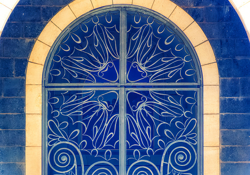 Capernaum, Israel, October 06 2018: Window decoration at The Beatitude Monastery near Capernaum in Israel.