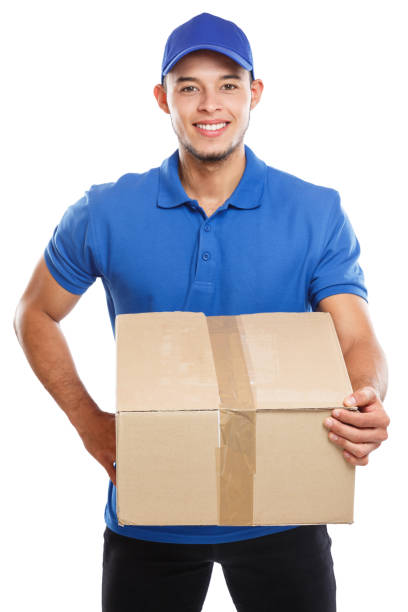 istock Parcel delivery service box package order delivering job education young latin man isolated on white 1369825681