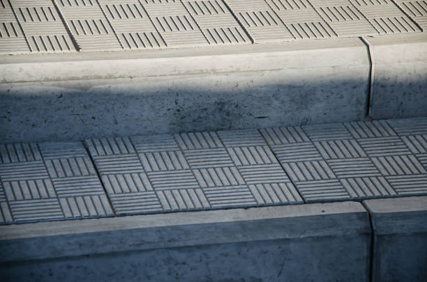 istock Abstract background. Old cobblestone pavement close-up. City 1369828396