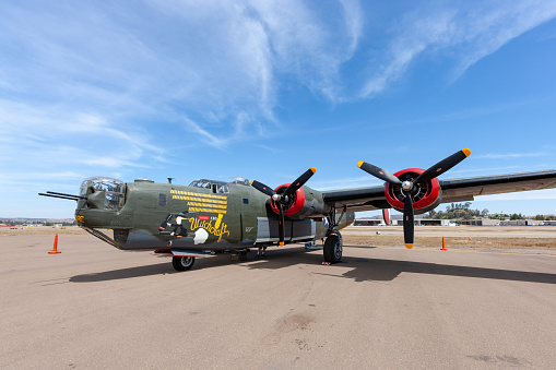 El Cajon, California, USA -  May 3, 2013: Consolidated B-24J Liberator World War II Bomber aircraft ‘Witchcraft’ operated by the Collings Foundation on the tarmac at Gillespie Field.