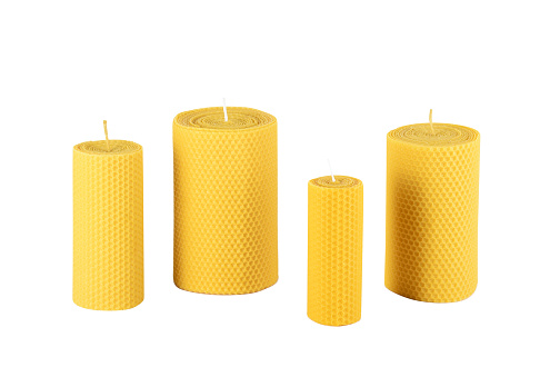 Group of beeswax candles isolated on the white background with clipping path
