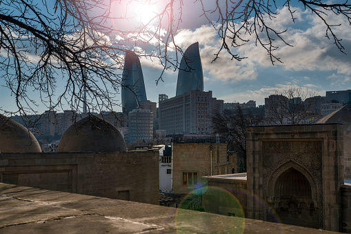 Baku, Azerbaijan - January 03 2022- View from shirvanshahs' palace complex and flame towers in background