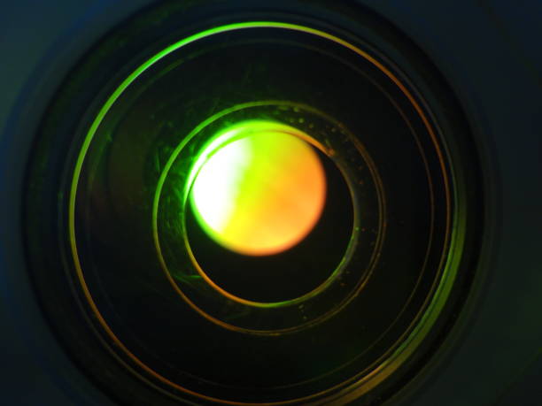 istock Abstract Neon Green Orange Black Colored Round Curve Shape Futuristic Modern Background 1369837452