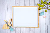 Easter product mockup with farmhouse theme on white wood background.