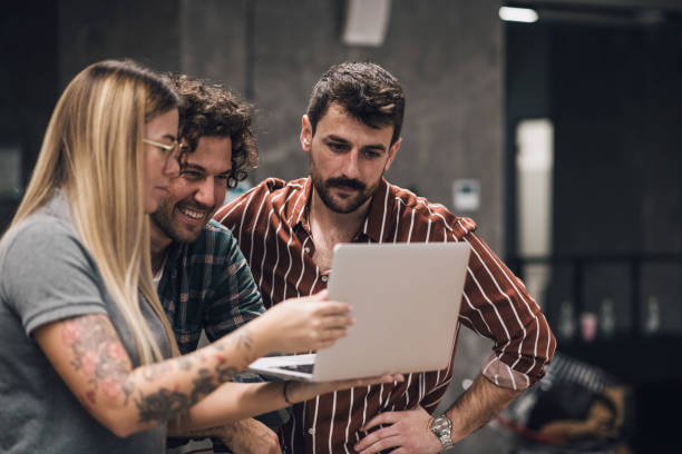 istock A hispter colleagues showing start up project to their boss. 1369839856