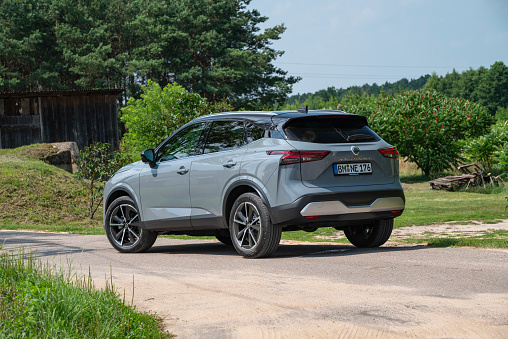 Berlin, Germany - 7th July 2021: Third generation of Nissan Qashqai stopped on a road. The Qashqai is one of the most popular SUV/crossover on European market.