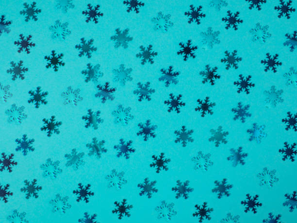 istock Background from blue snowflakes. Blue background. 1369852141