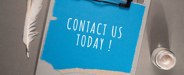 istock Close up of Contact Us Word 1369852854