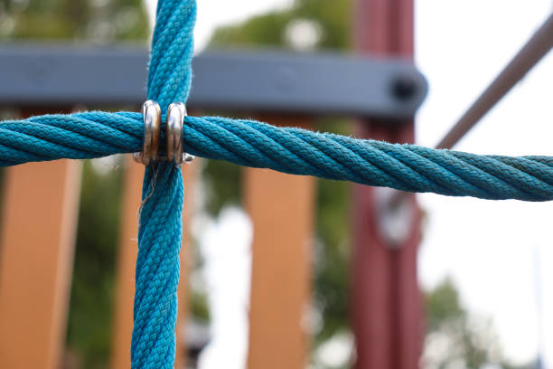 close up of blue climbing rope in playground