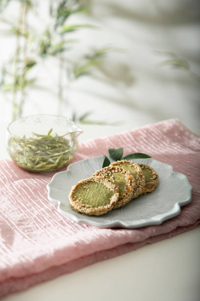 Chinese snack, Green tea cookie Chinese Matcha green tea cookies topped with sesame seeds junsai water shield stock pictures, royalty-free photos & images
