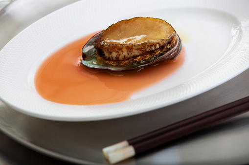 Close-up of abalone in brown sauce,seafood dish in China