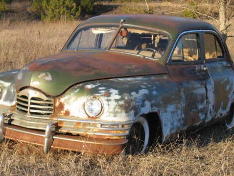 Rusty old car in a field. I would really appreciate knowing how you use my photo!