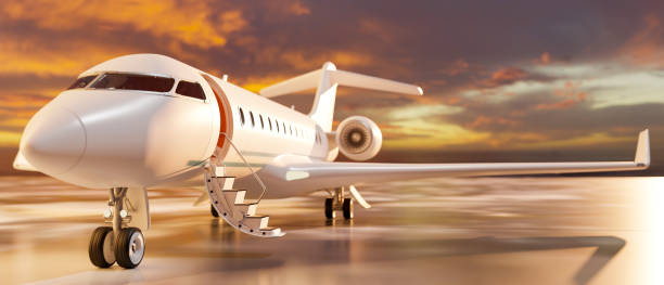 istock Luxury private jet parked on ground, Passenger airplane parked over sunset sky view 1369864080