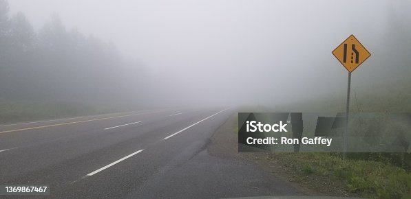 istock Foggy highway in British Columbia Canada 1369867467