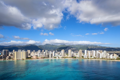 Aerial view of modern buildings and Diamond head mountain in background, Honolulu, Hawaii Islands, Oahu, USA.