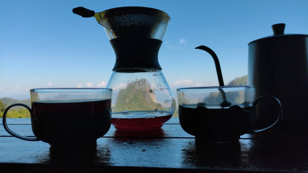 istock Equipment for making drip coffee beautiful mountain view cool morning. 1369877021