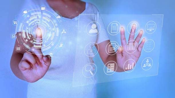istock Person touching virtual screen to scan fingerprints. 1369877850