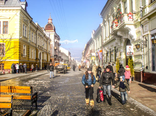 January 11, 2011, Kiev, Ukraine. People enjoy the morning hours, walking and shopping among the architecturally stunning buildings.  On this cold day in winter, the brightly lit buildings shine, offering stunning views for all who walk the streets.