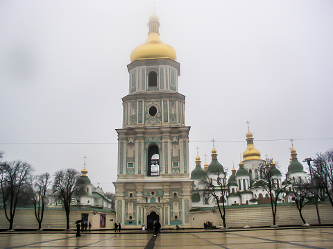 Golden domes of a Russian Orthodox Church in Barnaul, Russia, on a misty morning