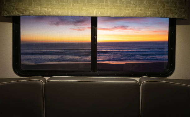 istock Scenic Ocean Sunset Through Motor Home RV Window 1369890166