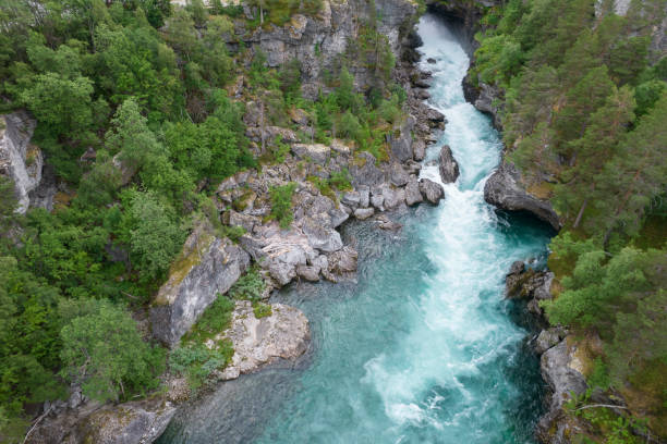 Scenic Aerial View of Norwegian Crystal Clear Glacial River Scenic Aerial View of Norwegian Crystal Clear Glacial River. Vestland County, Norway Scenery. purified water photos stock pictures, royalty-free photos & images