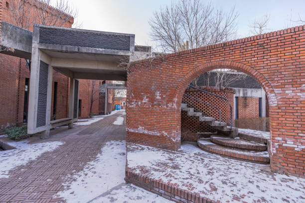 istock red brick building garden 1369891612