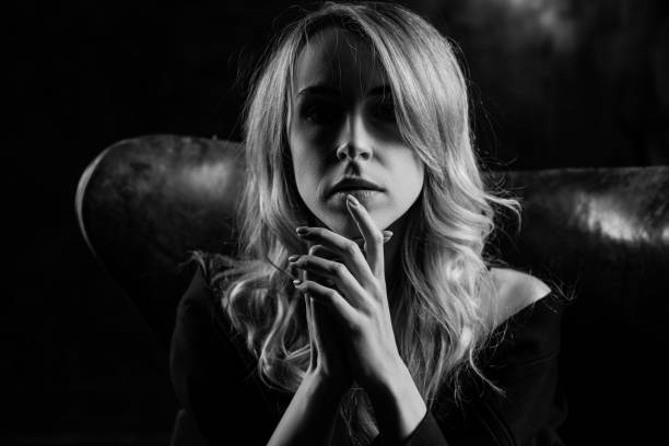 istock Woman portrait in thoughtful pose 1369893042