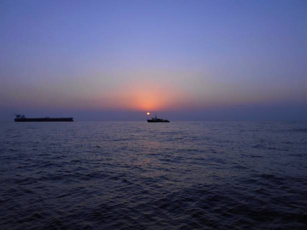 istock Early morning at sea during sunrise 1369898105