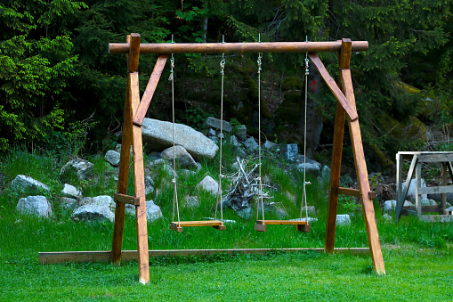 Close-up of an empty swing in the park