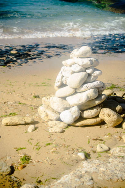 istock Pile of stones on the beach 1369899391