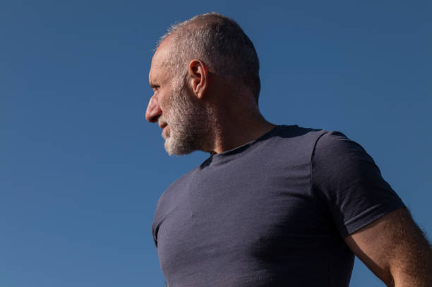 istock Adult man against sky on a sunny day 1369900629
