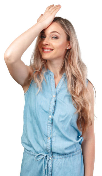 istock Young woman standing over white isolated background surprised with hand on head for mistake 1369901028