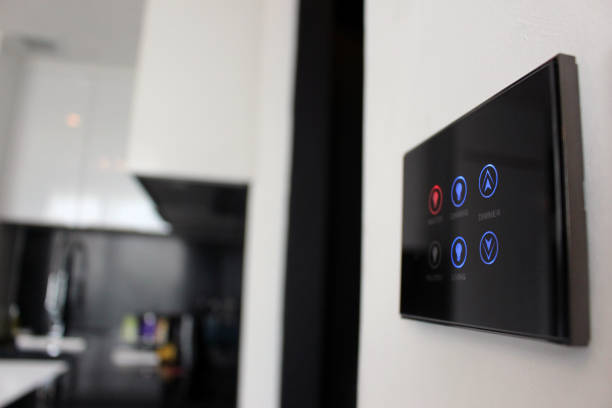 istock Close-up of illuminated smart home touch screen panel 1369904015