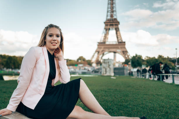 istock beautiful blonde woman in paris 1369906175
