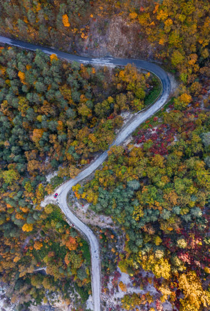 istock road seen from the sky in autumn 1369908571